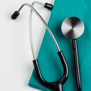 stethoscope on green and white background